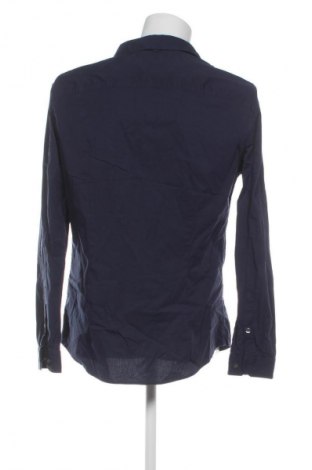 Pánska košeľa  Tommy Jeans, Veľkosť XL, Farba Modrá, Cena  35,95 €