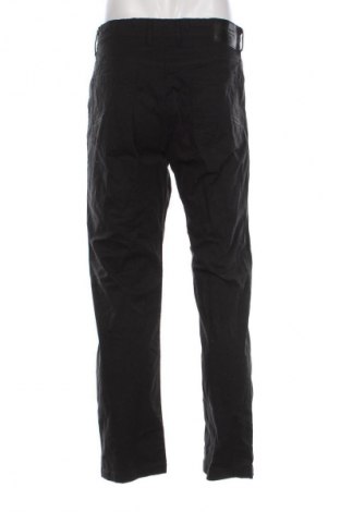 Pánske džínsy  C&A, Veľkosť M, Farba Čierna, Cena  8,95 €