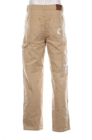 Férfi farmernadrág Karl Kani, Méret M, Szín Bézs, Ár 12 399 Ft