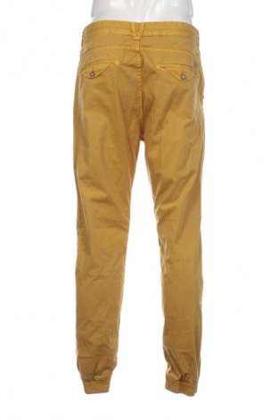 Męskie spodnie Pull&Bear, Rozmiar L, Kolor Żółty, Cena 125,84 zł