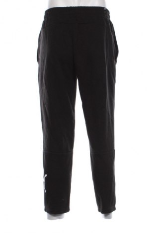 Męskie spodnie sportowe PUMA, Rozmiar M, Kolor Czarny, Cena 108,99 zł